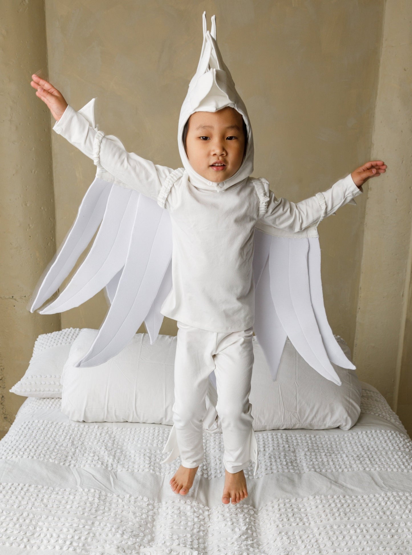 White bird costume, pajama costume for kids, eco-friendly, environmentally friendly costumes, halloween costumes for kids.