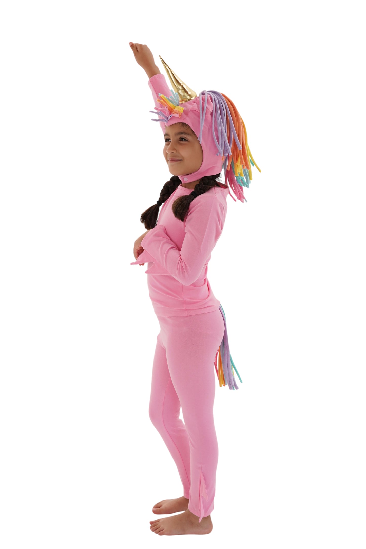 Child in a pink unicorn costume with rainbow hair, pink unicorn pajama, rainbow unicorn.