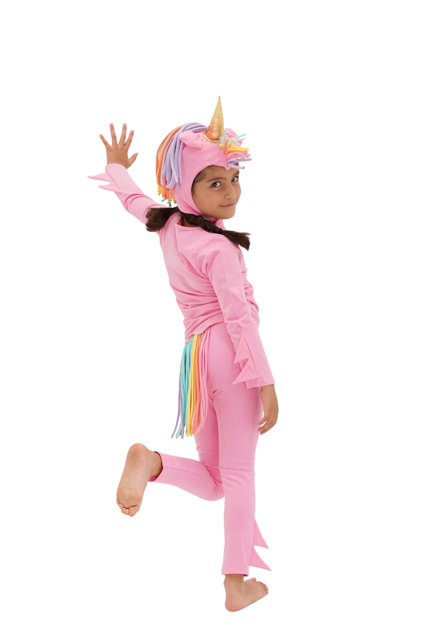 Child in a pink unicorn costume with rainbow hair, pink unicorn pajama, rainbow unicorn.
