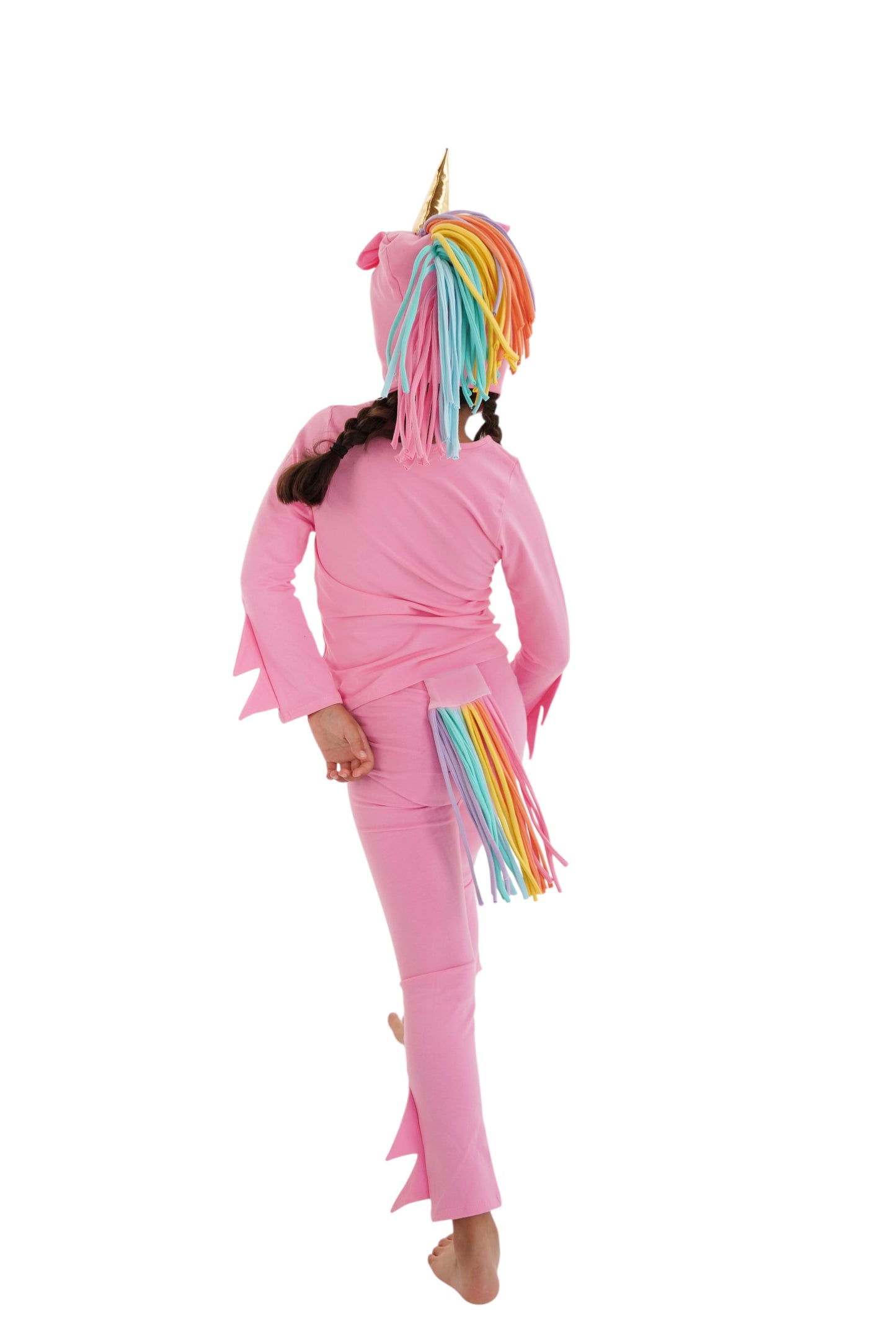 Child in a pink unicorn costume with rainbow hair, pink unicorn pajama, rainbow unicorn.