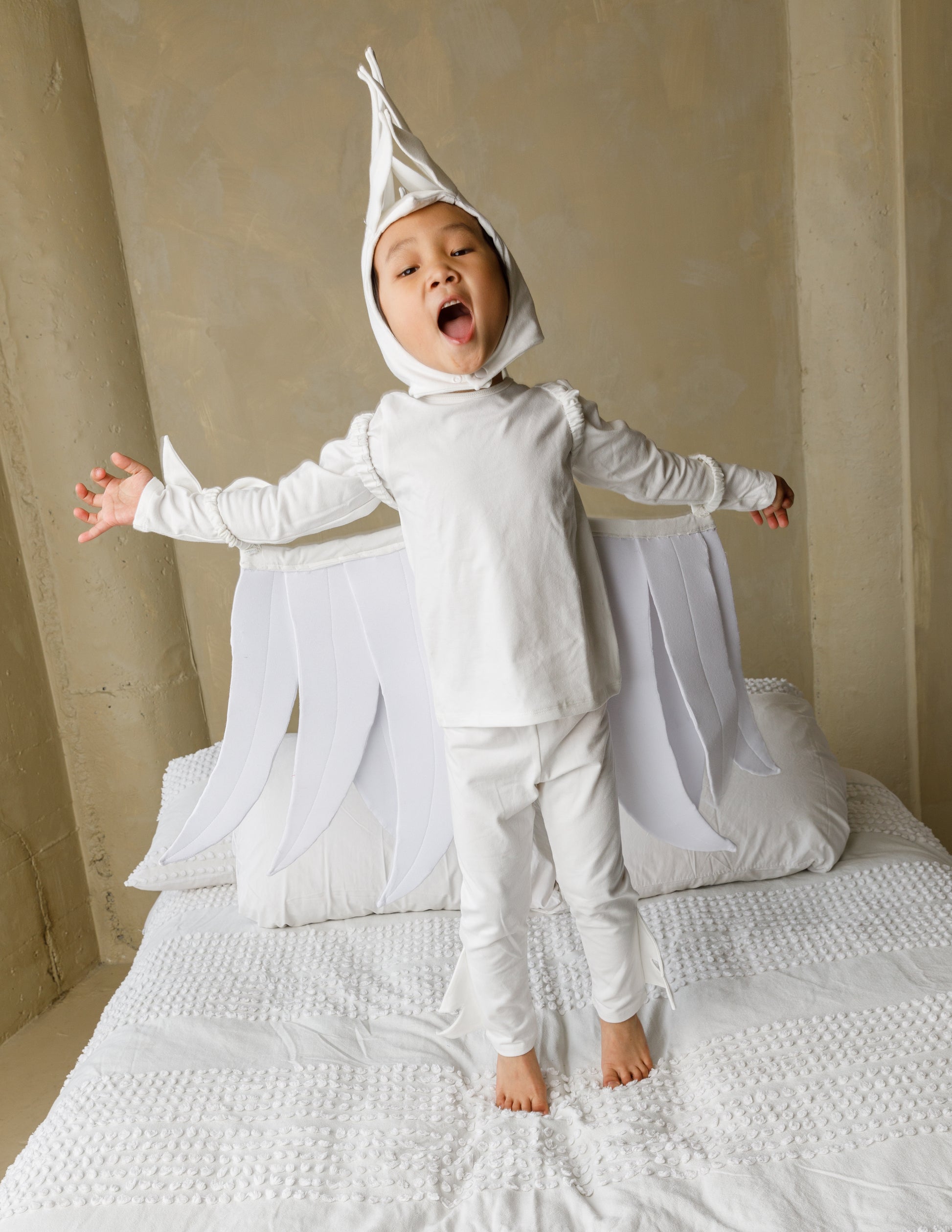 White bird costume, pajama costume for kids, eco-friendly, environmentally friendly costumes, halloween costumes for kids.